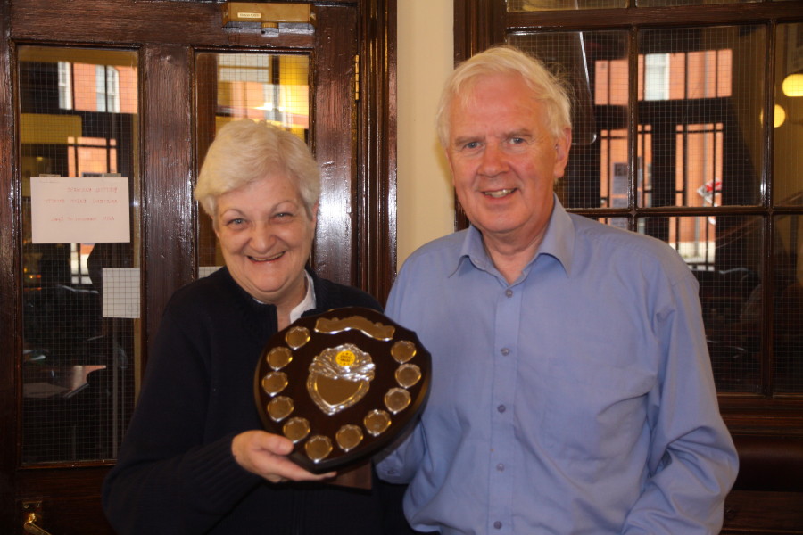 AGM 2014 - G4GNQ presents the Tuckfield Trophy to Mrs Coral Sims AGM 2014 - G4GNQ presents the Tuckfield Trophy to Mrs Coral Sims